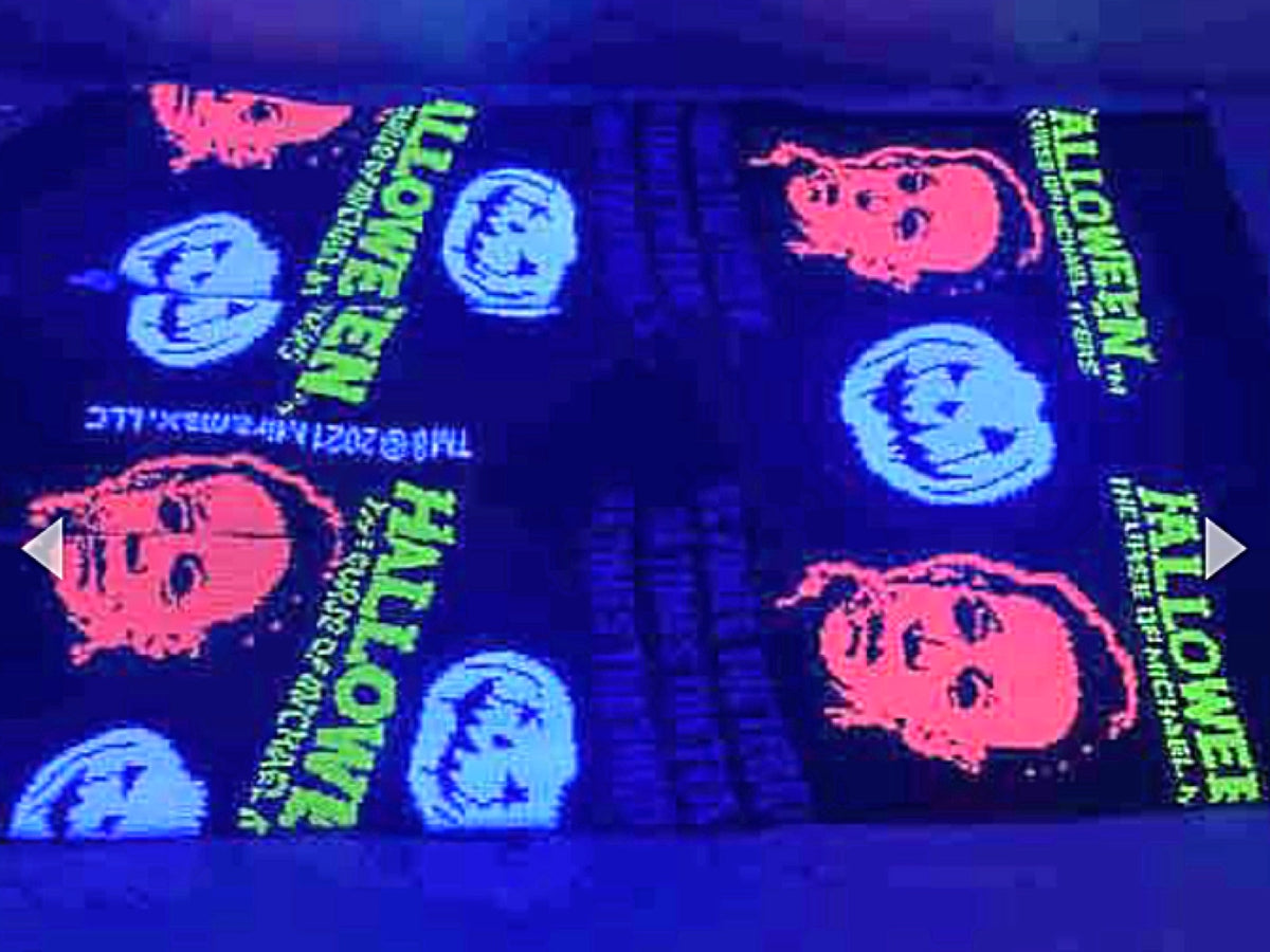 HALLOWEEN MENS MICHAEL MYERS BLACK LIGHT CREW SOCKS BIOWORLD BRAND - Novelty Socks for Less