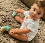 BOOGIE TOES Unisex Baby FOOTBALL RATTLE GRIPPER BOTTOM SOCKS By PIERO LIVENTI - Novelty Socks And Slippers